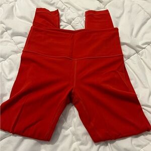 Red Athleta leggings